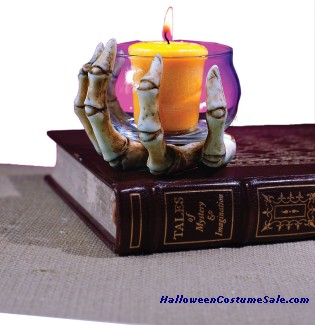 SKELETON HAND WITH GLASS VOTIVE