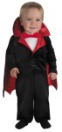 This adorable costume includes: jumpsuit in luxurious velvet, lined with red satin contrast, attached lined cape with snap closure pants. Socks not included. 100 percent polyester.